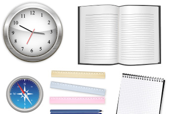 writing supplies, a clock and a compass