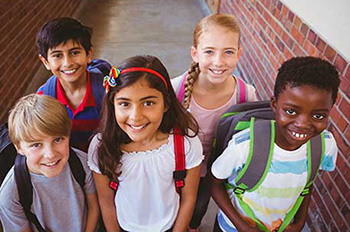 Five smiling students