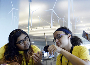 Two female students focused on a CTE project